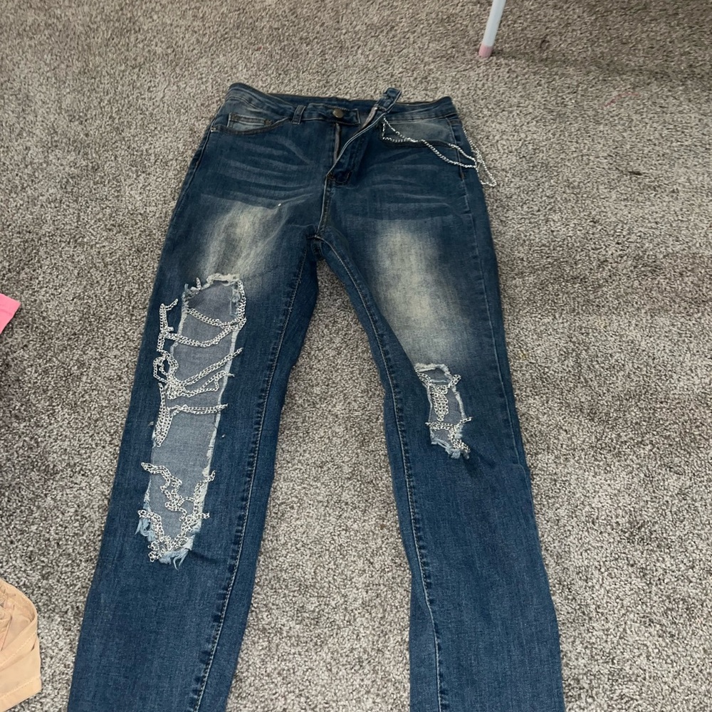 Distressed Blue Denim Jeans